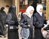 حضور دختران سعودی در داربی جده با پوشش مردانه 